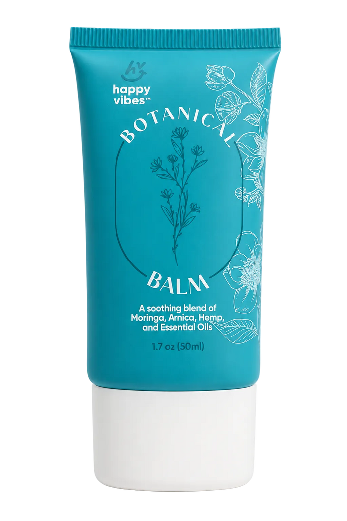Happy Vibes Botanical Balm back of tube showing Drug Facts panel, external analgesic with hemp, camphor, peppermint, arnica, moringa, eucalyptus, DMSO