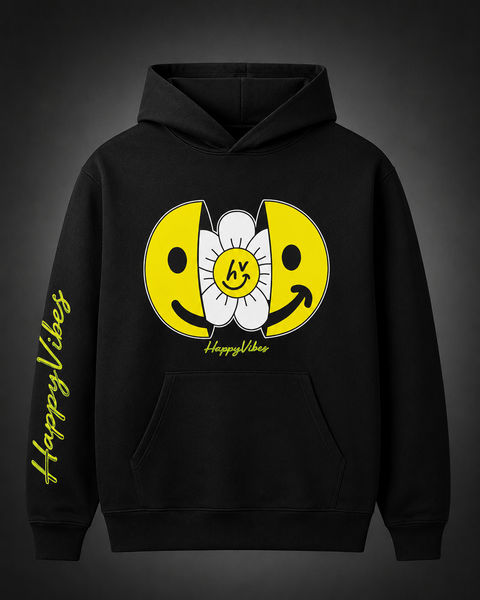 Person wearing a smile hoodie with a cheerful smiley face and happy vibes message promoting positivity and warmth