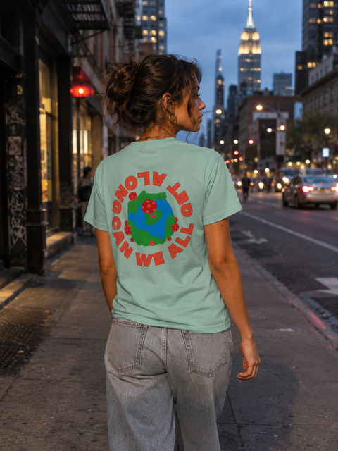 We Can All Get Along t-shirt with Earth and mushroom design promoting unity and positivity